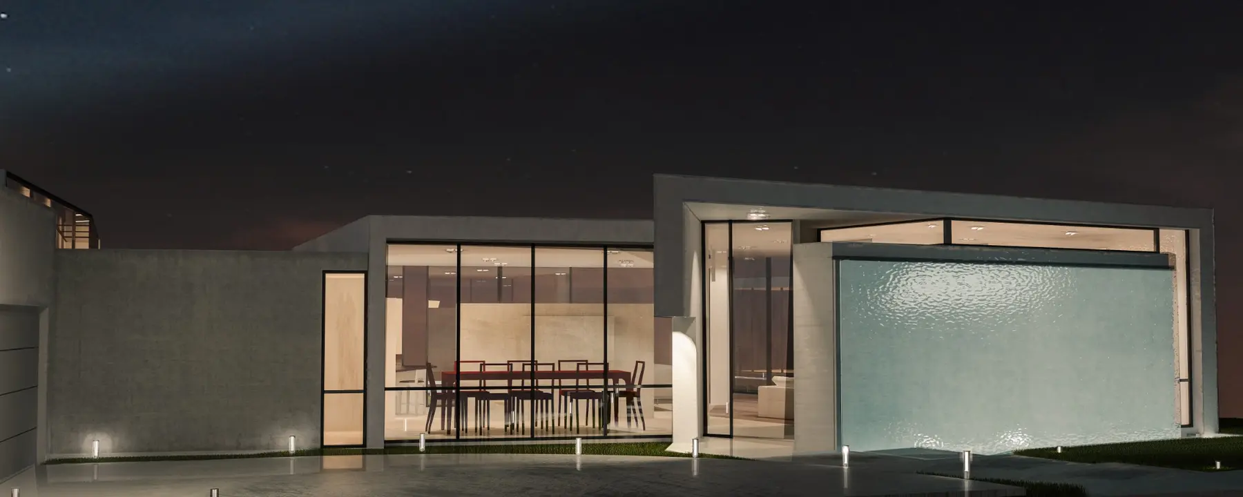 Entry court with water wall, dining room and framed glass openings