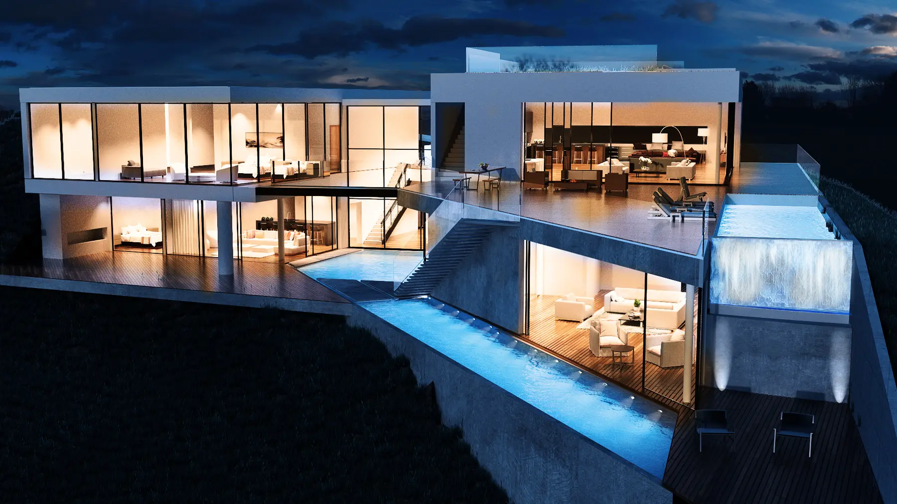 Illuminated ocean-facing elevation with open living spaces, terraces and water