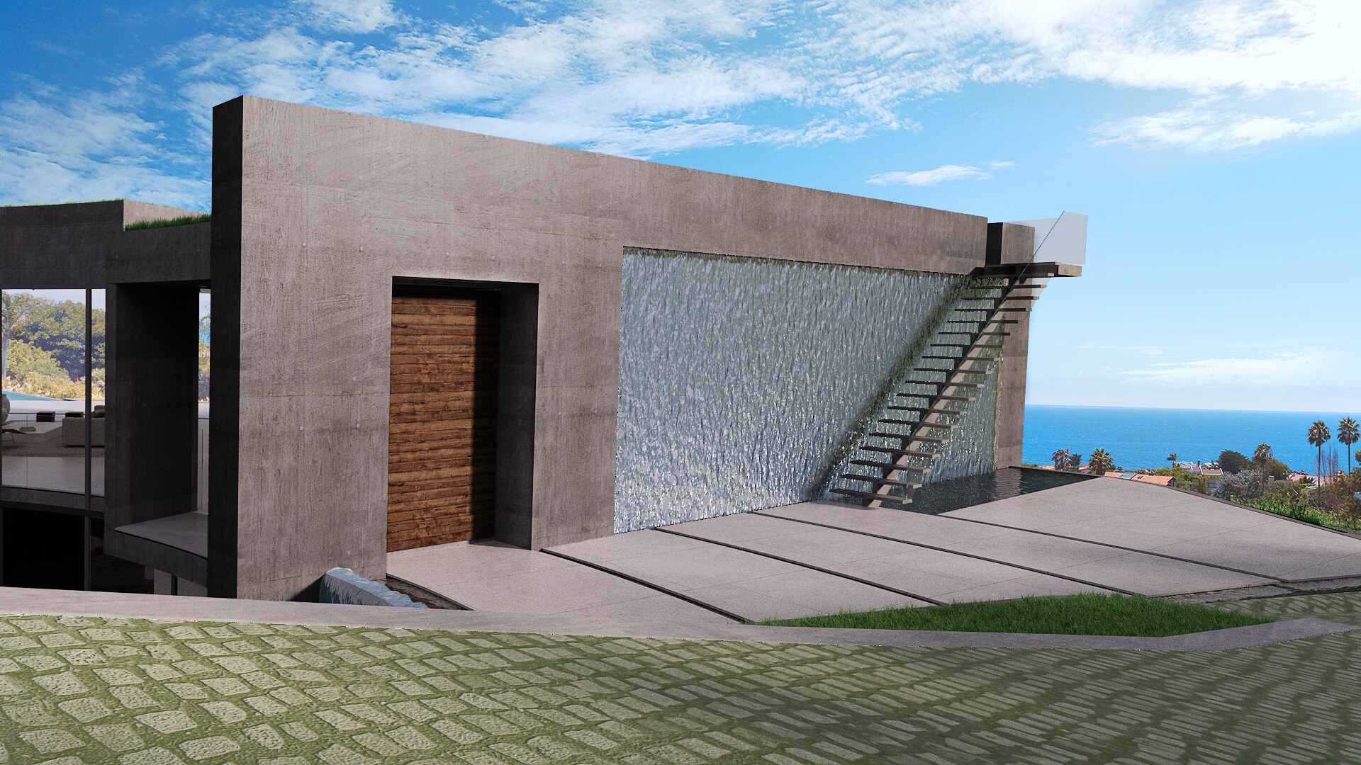 Entry court with a broad textured water wall and exterior stair