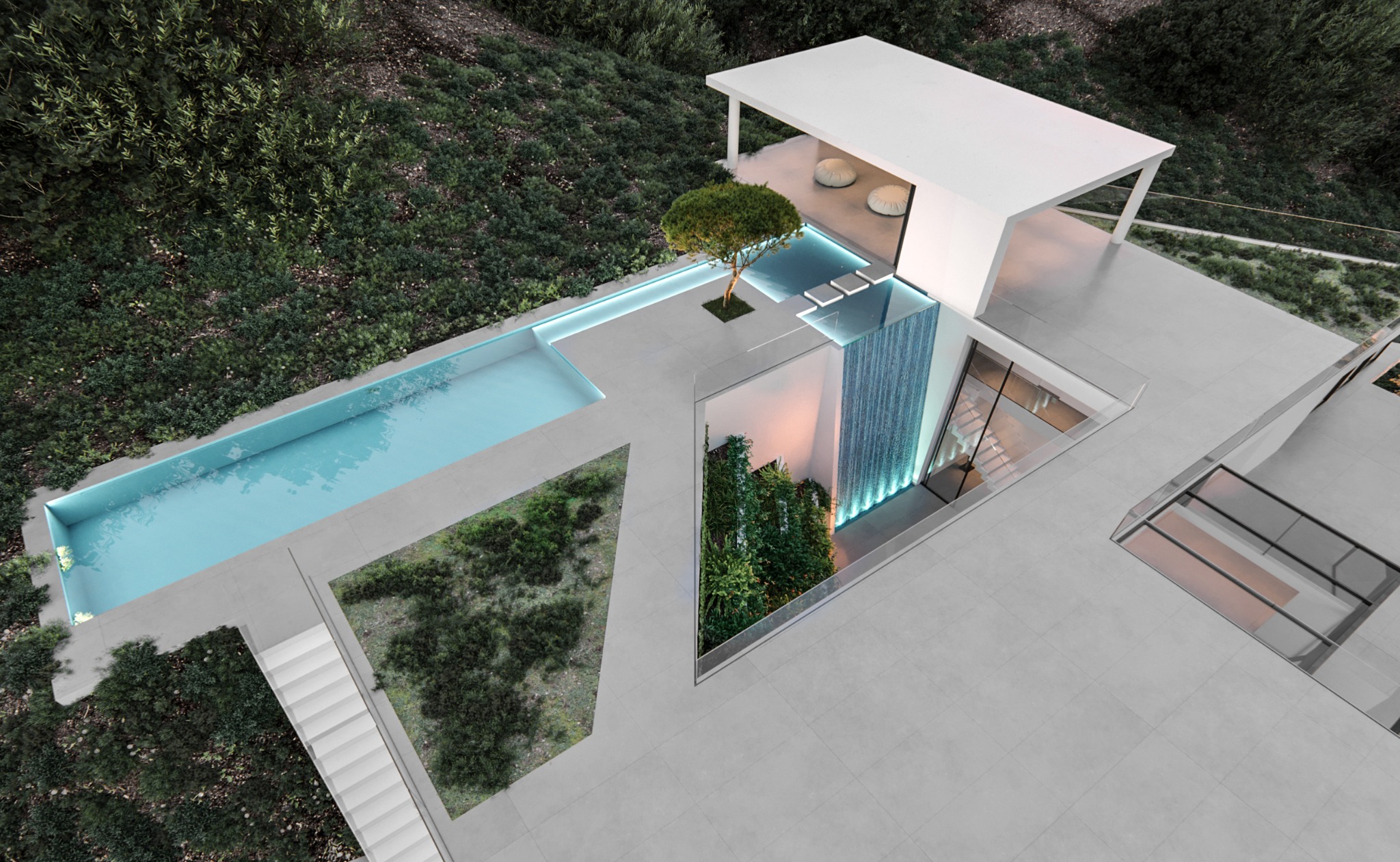 Roof pool overflowing as a waterfall into the central courtyard