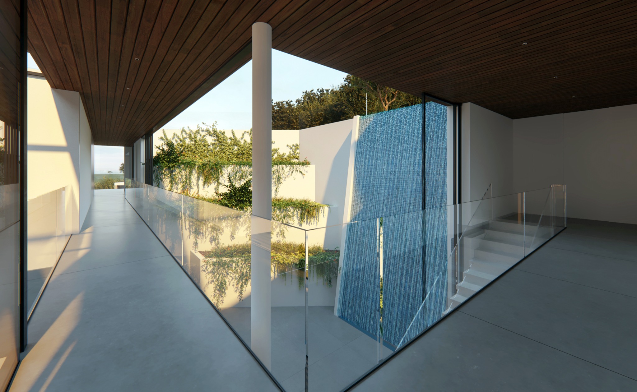 Upper-level passage overlooking the courtyard waterfall
