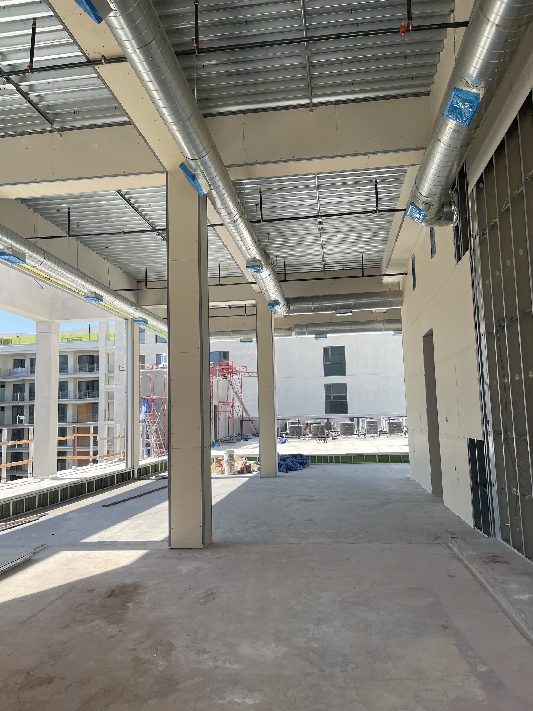 Exposed ductwork and building systems overhead
