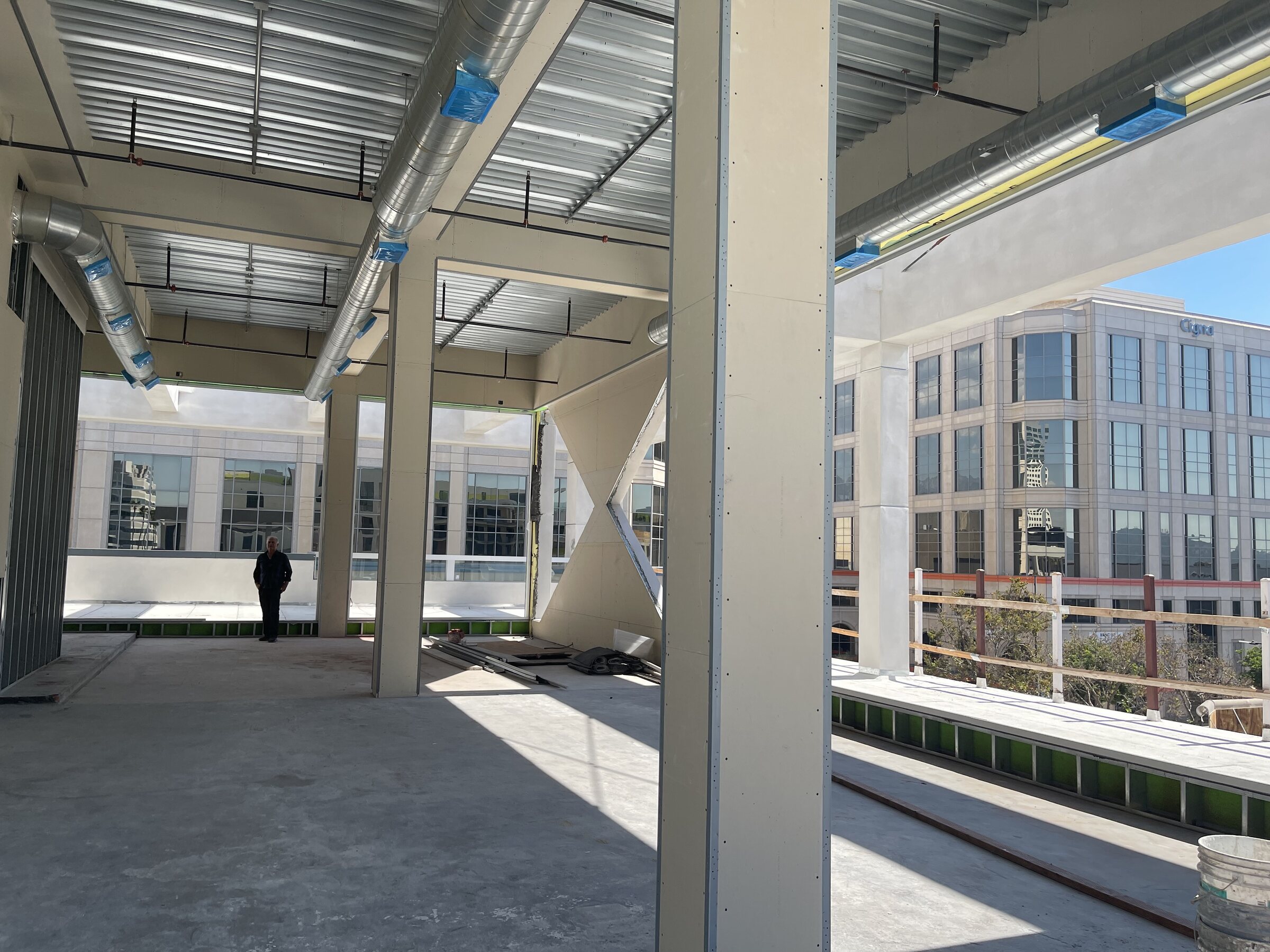 Open interior framed toward the surrounding urban context