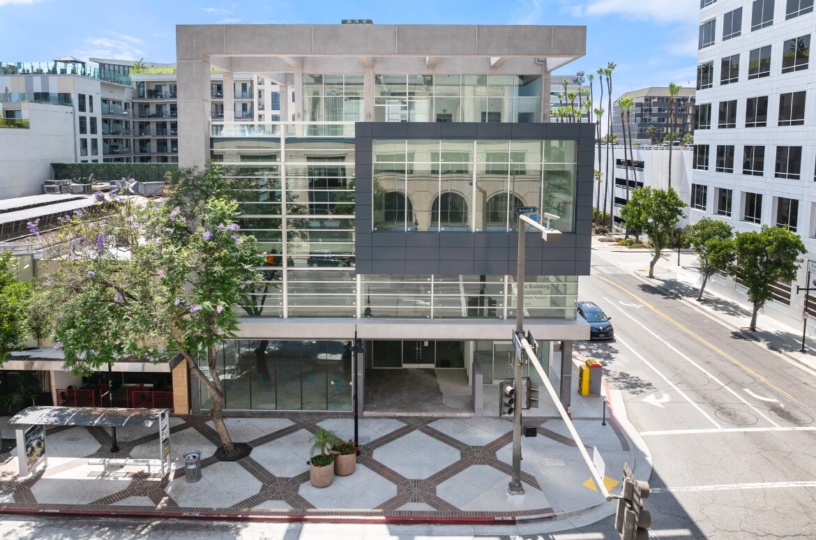 Elevated view of the completed building and urban corner