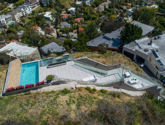 Aerial context showing the completed 8693 Franklin terraces embedded in the hillside