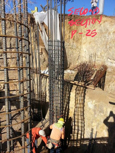 Dense vertical reinforcing steel during hillside construction