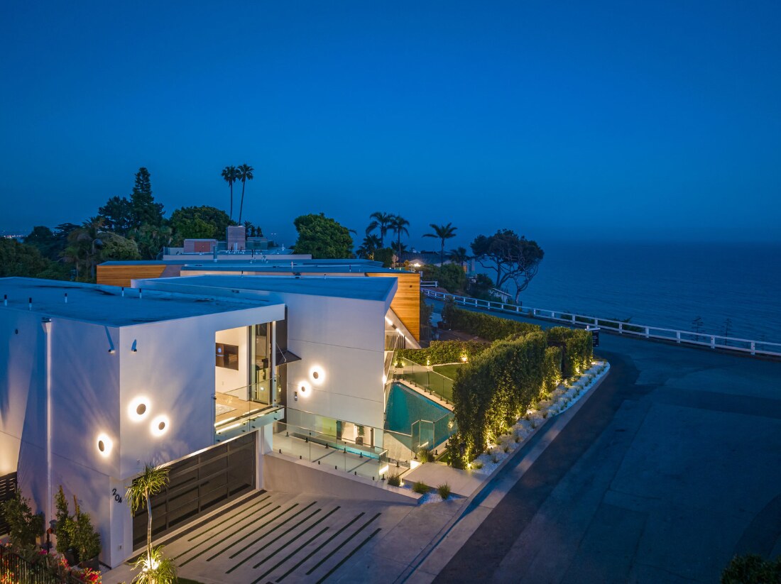 Coperto residence overlooking the ocean at blue hour