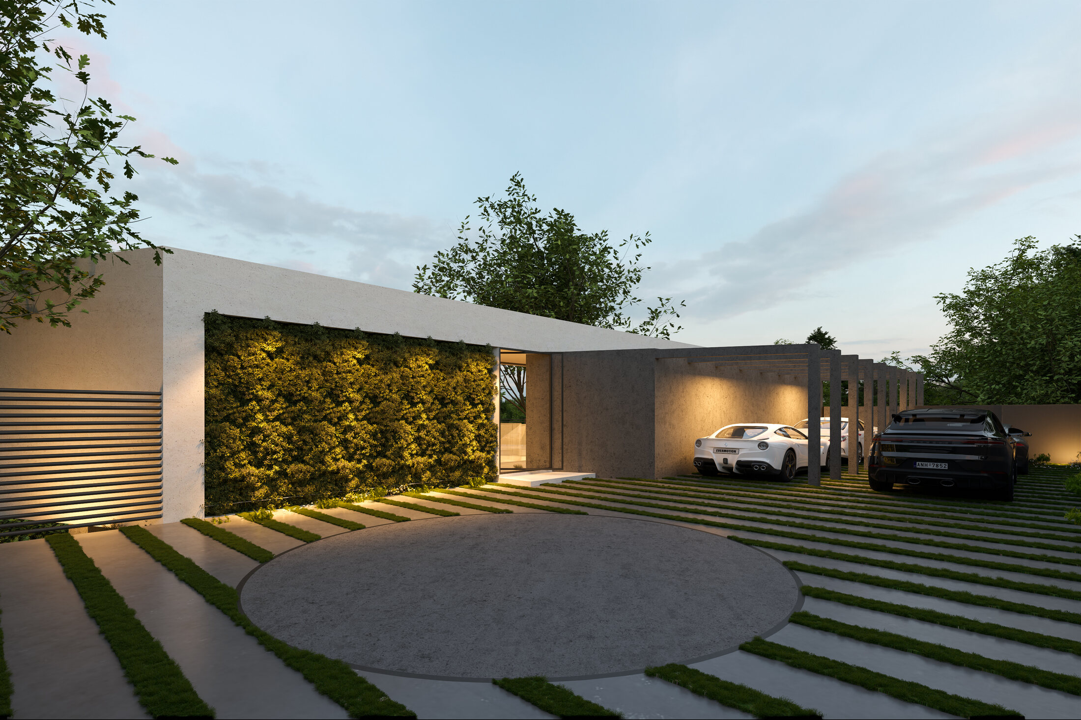 Arrival court and living wall illuminated at dusk