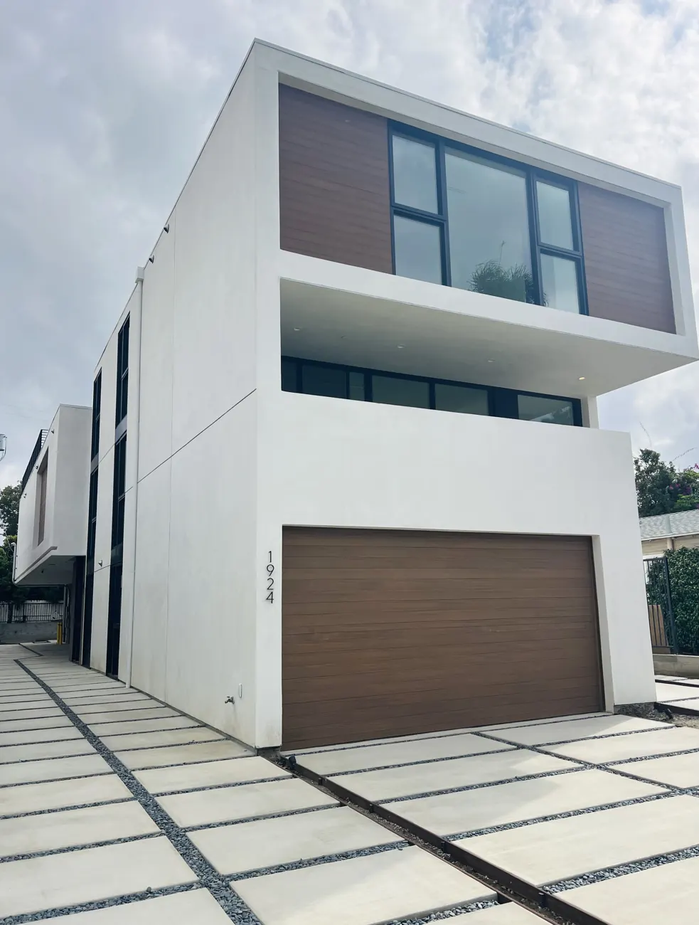 Angled view of a Federal condominium from its driveway