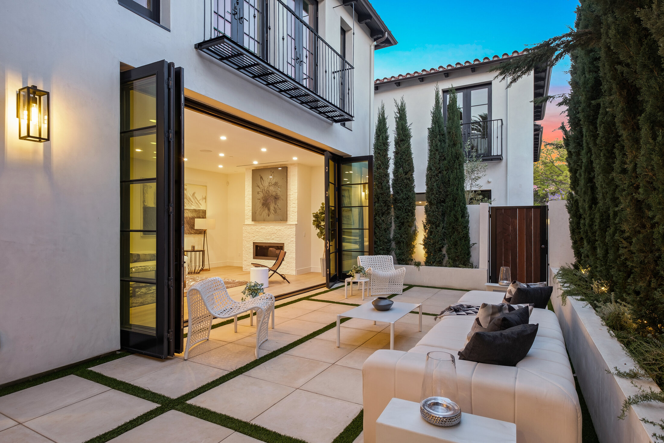 Private courtyard connected to the living room through folding glass doors