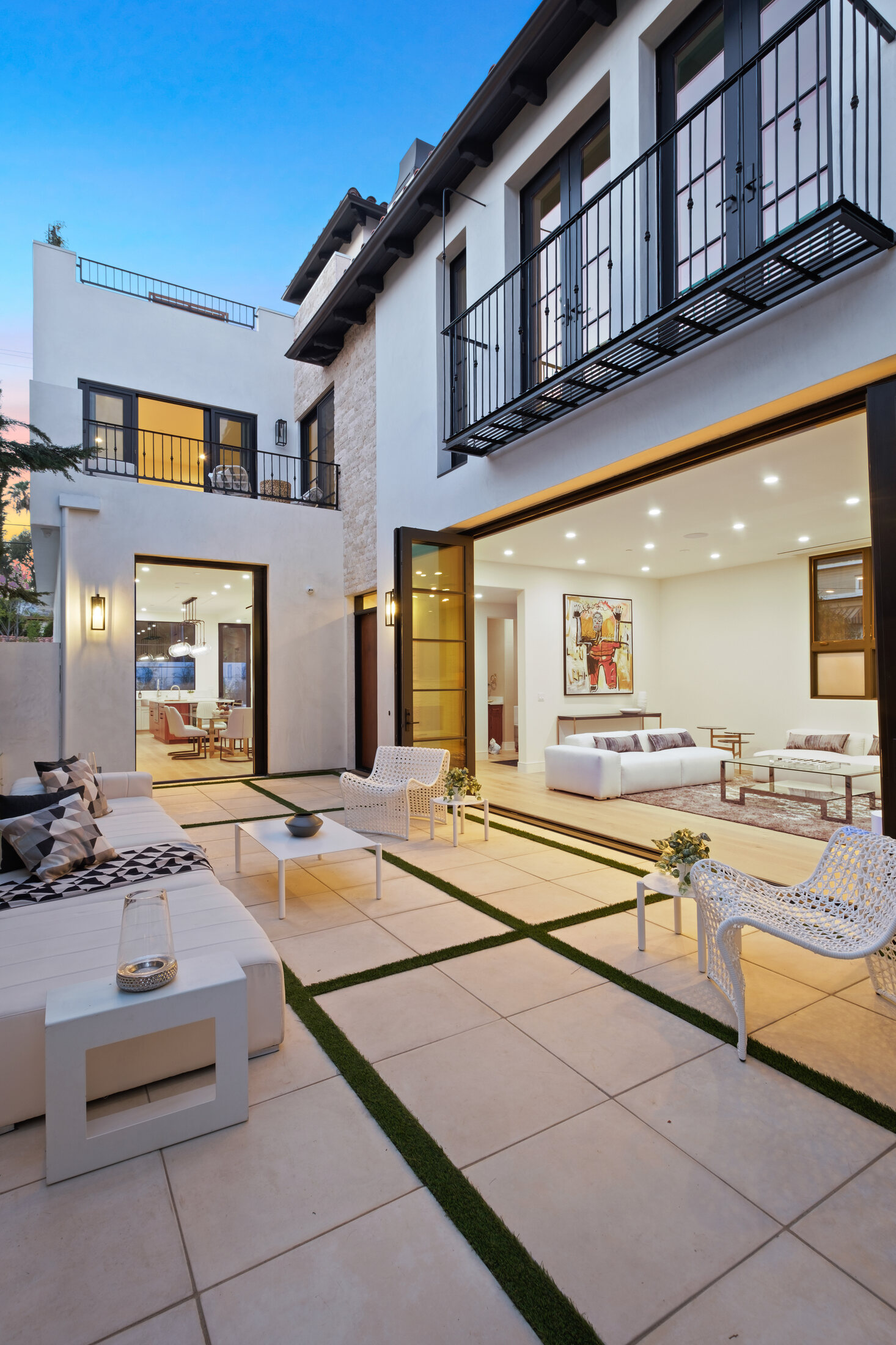 Paired residences viewed across a private courtyard