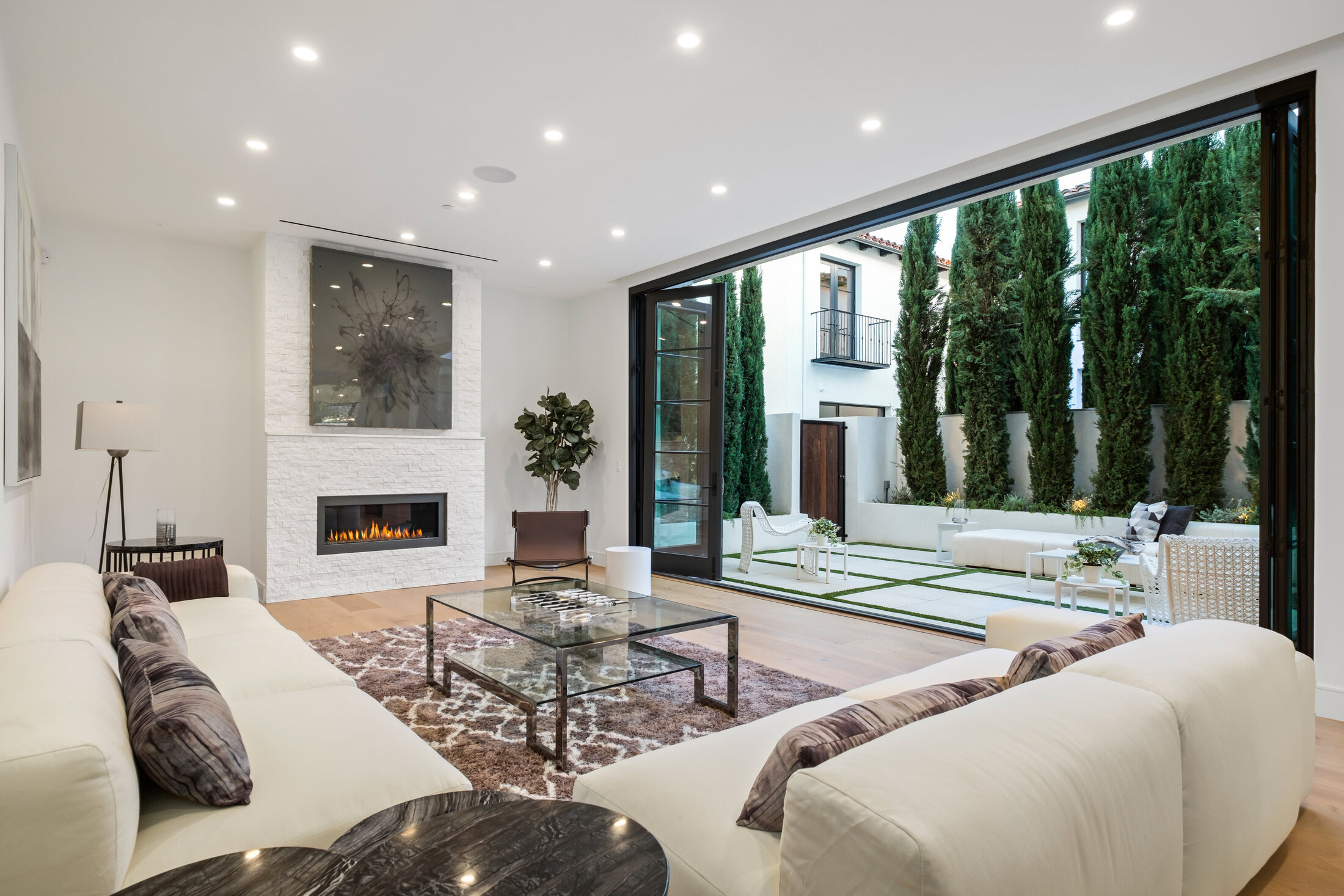 Living room view toward the planted courtyard