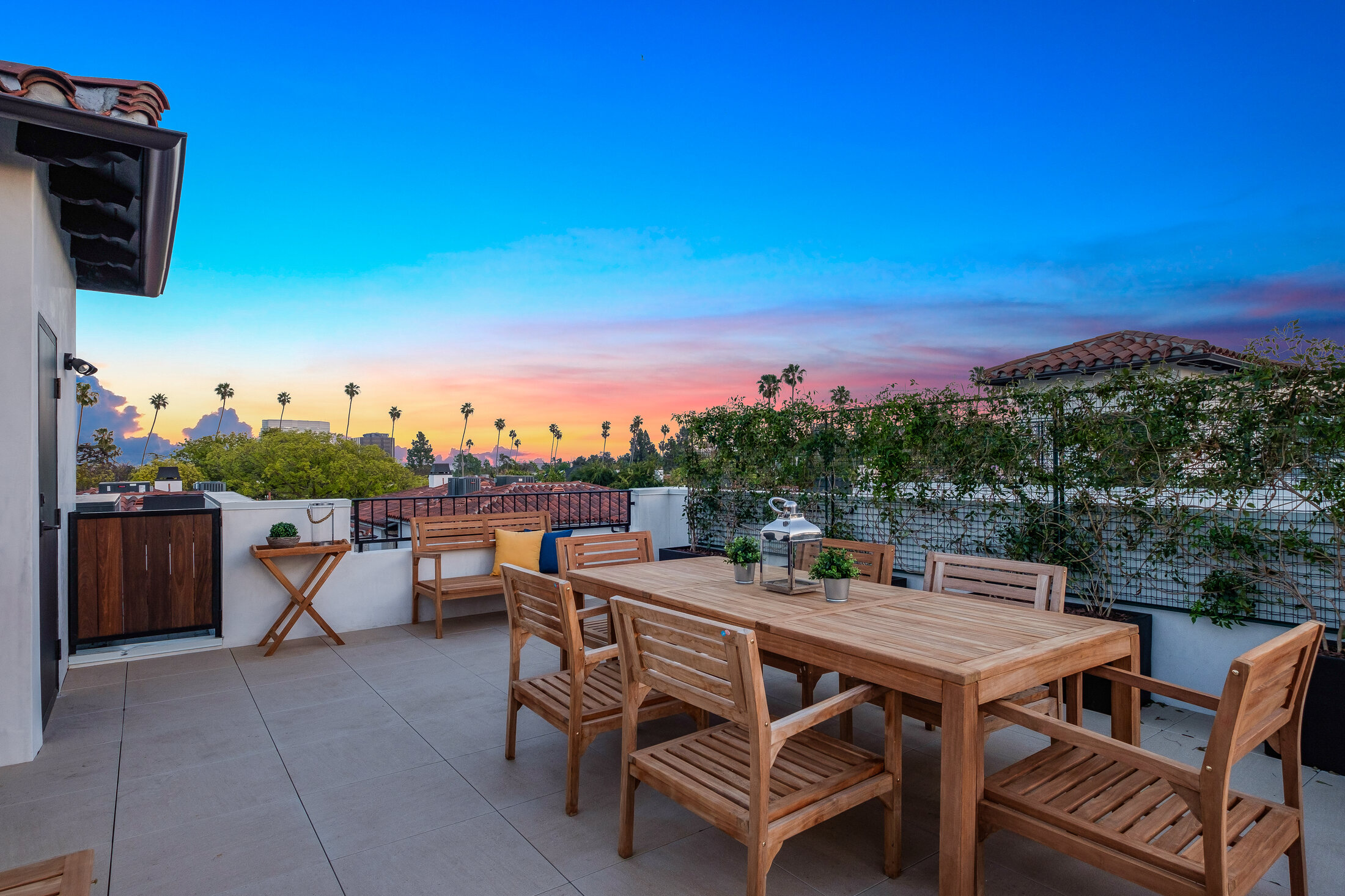 Second roof terrace with dining and sunset views