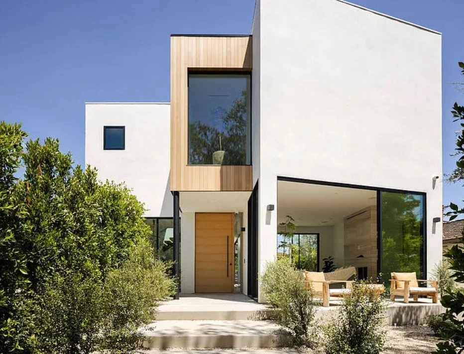 Completed 116 Gretna Green residence with planted entry and glazed living room
