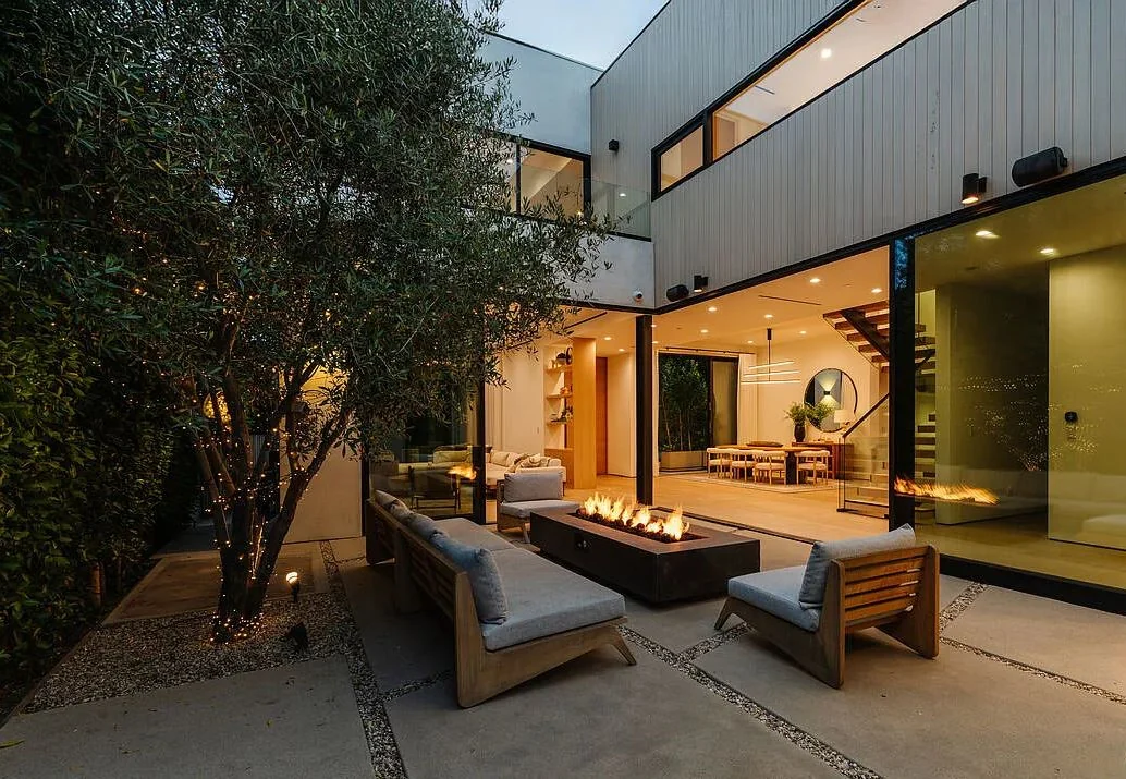 Evening courtyard at the completed 116 Gretna Green residence