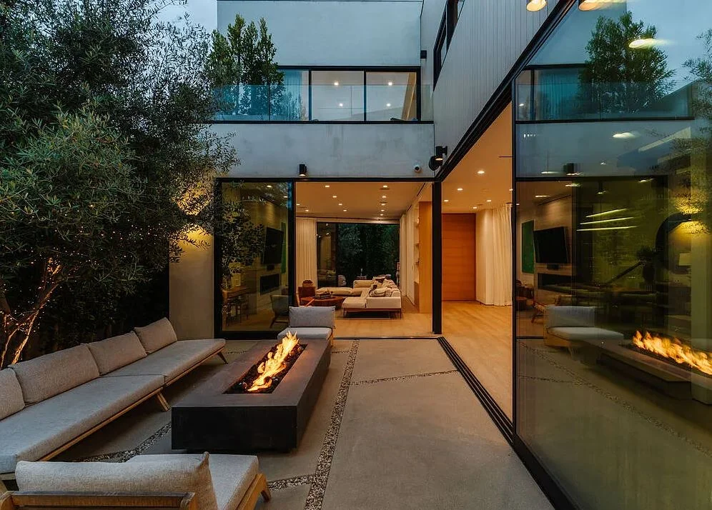 Courtyard at dusk at the completed 116 Gretna Green residence