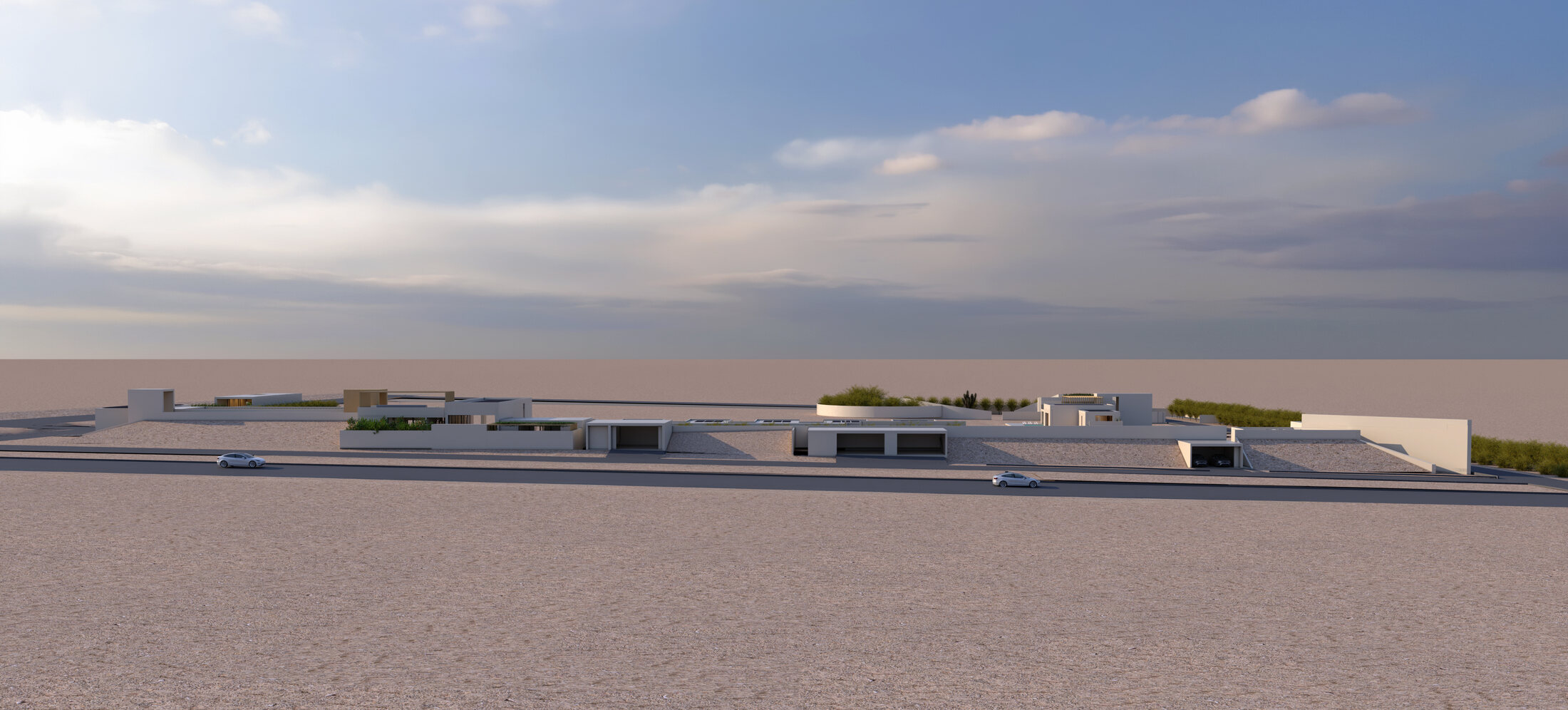 Long low profile of the retreat against the desert horizon