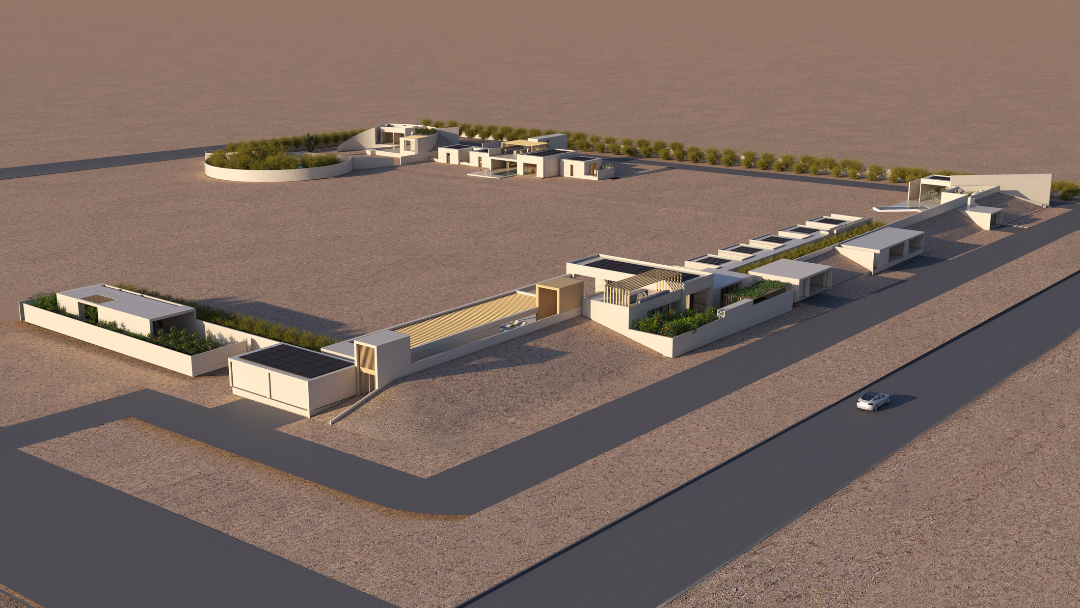 Aerial approach to the long retreat wing and distant circular courtyard