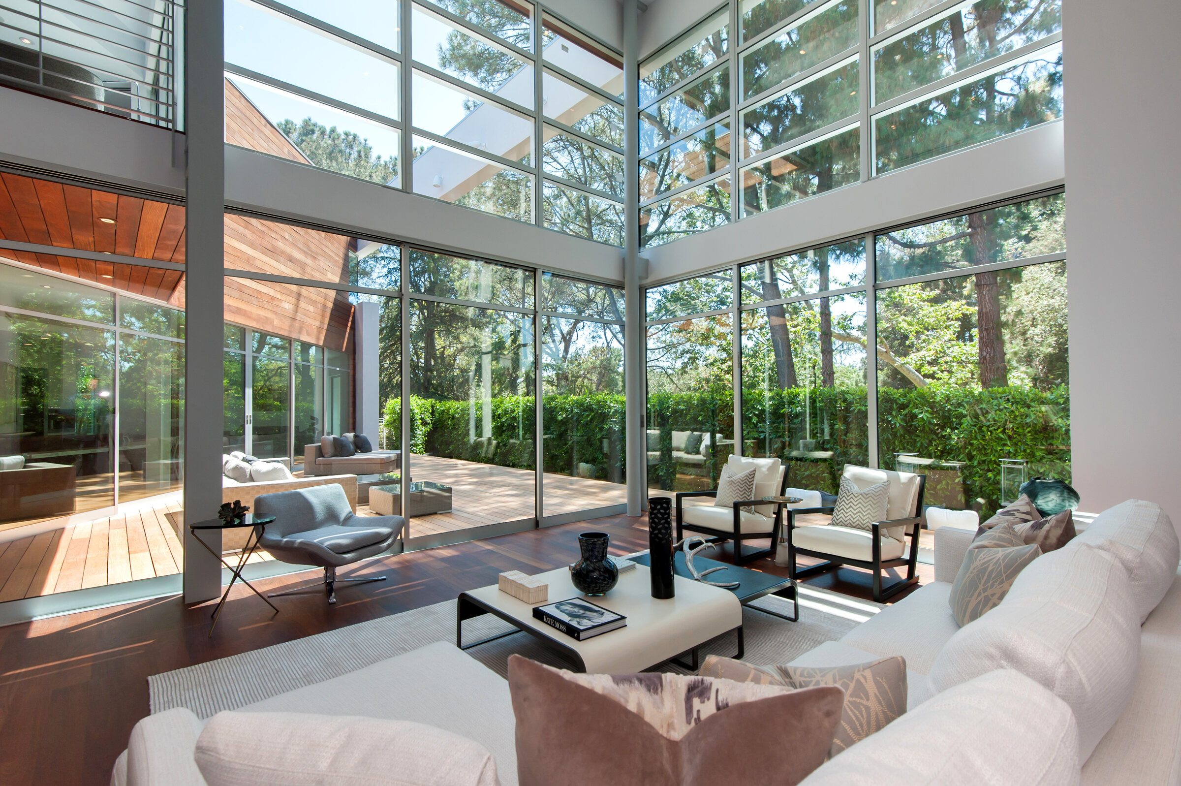 The double-height living space opens to the landscape