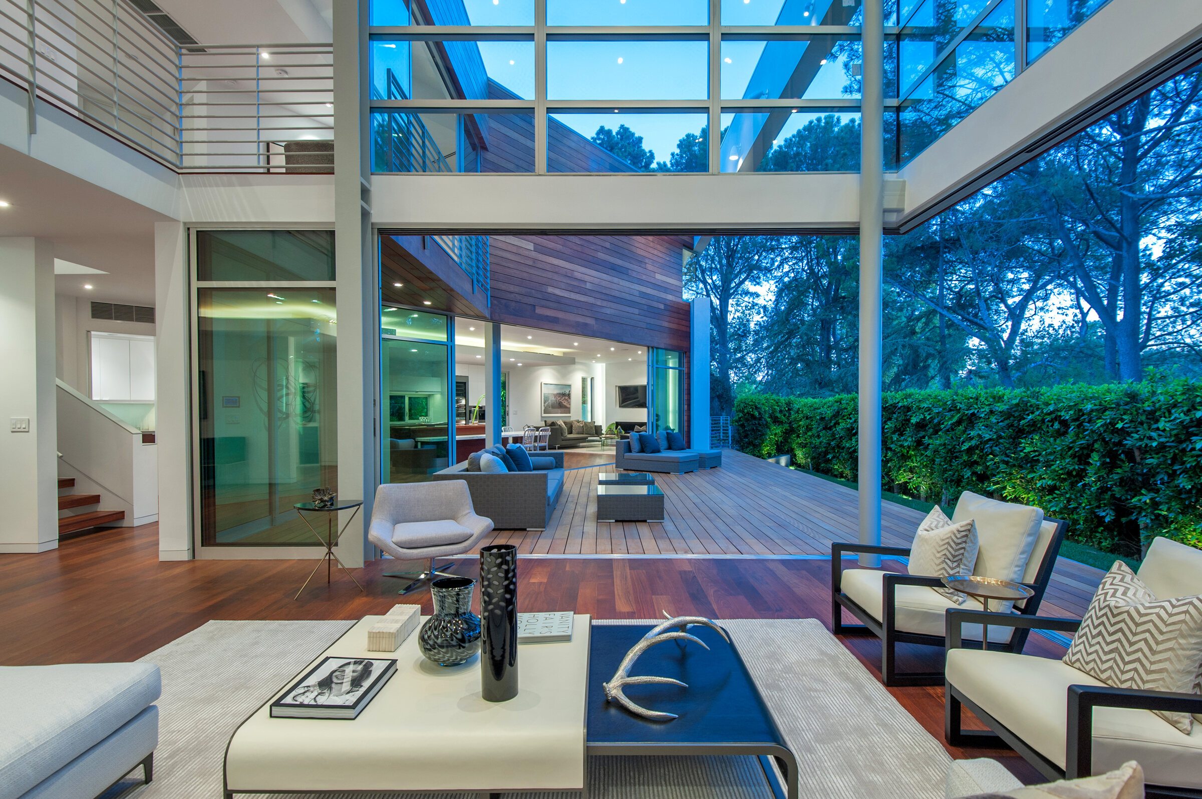 Interior opening toward the courtyard at blue hour