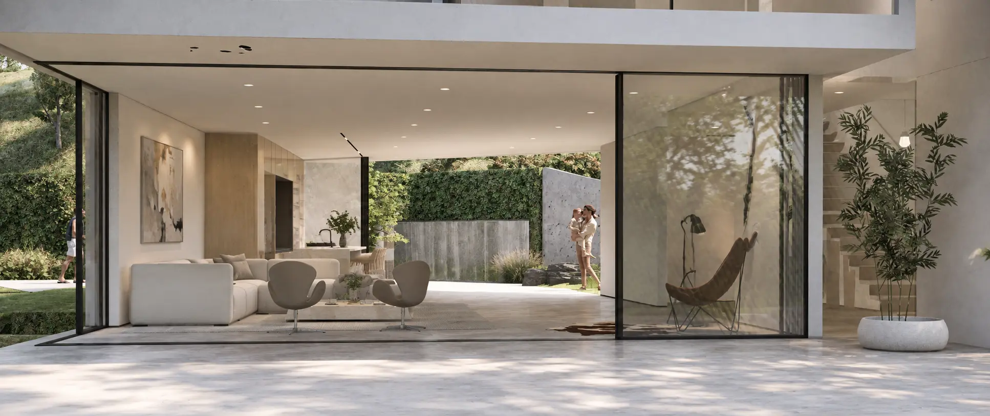 View from the deck above the ADU through the living room and open kitchen to the rear yard and existing retaining wall