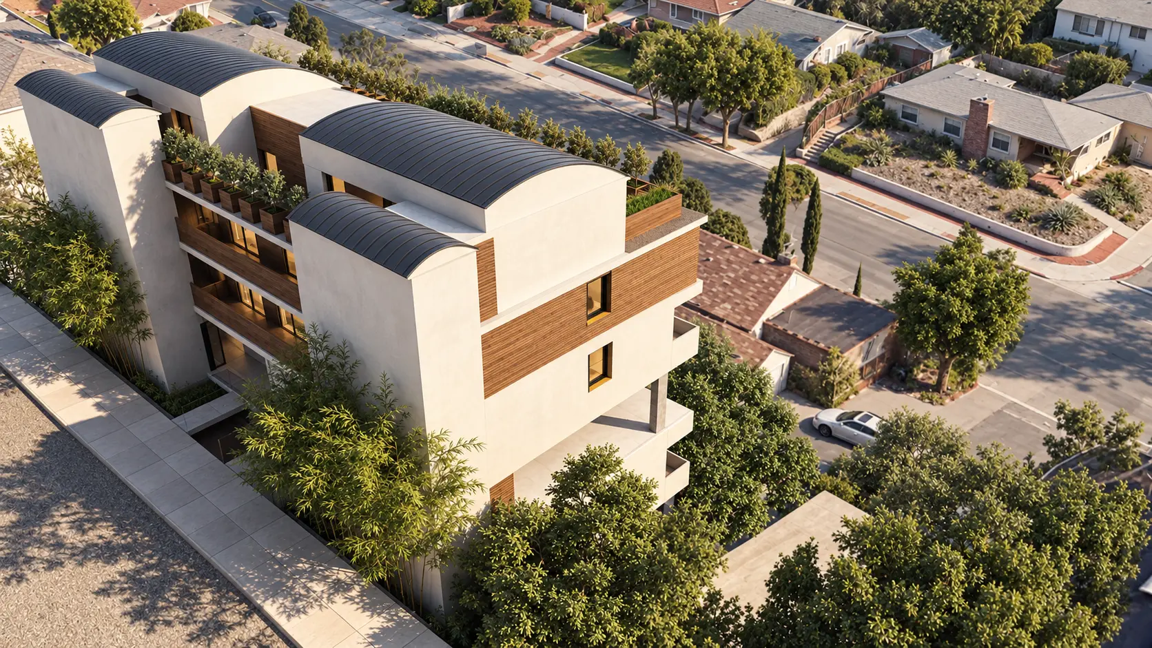 Neighborhood aerial view of the stepped Wilshire apartment building